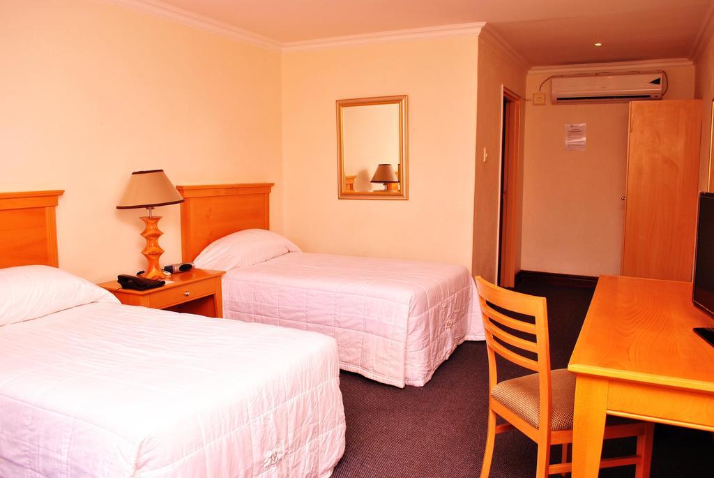The George Hotel Manzini Szoba fotó