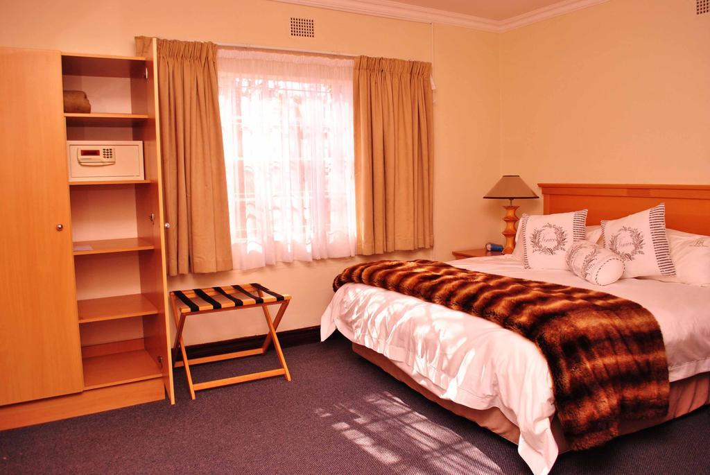 The George Hotel Manzini Szoba fotó